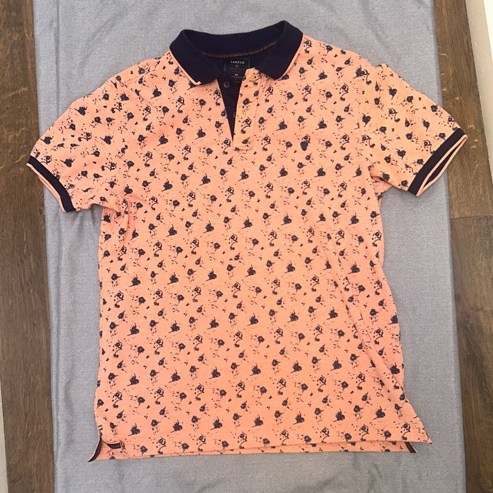 Stylish Print Polo With Navy on Salmon.
Gently Worn and Always Well Maintained.